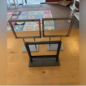 Sign holders (Set of 3) in perfect condition size 5x7 flat base.